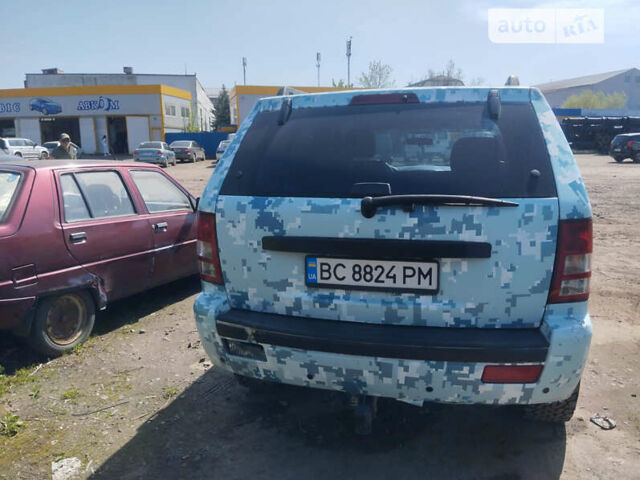 Білий Джип Grand Cherokee, об'ємом двигуна 3 л та пробігом 257 тис. км за 8000 $, фото 8 на Automoto.ua