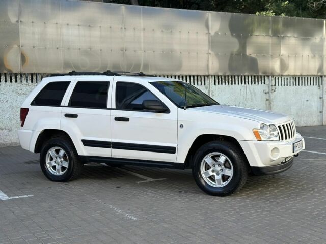 Белый Джип Гранд Чероки, объемом двигателя 4.7 л и пробегом 225 тыс. км за 7800 $, фото 1 на Automoto.ua