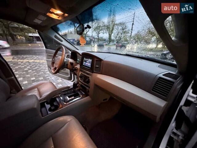 Белый Джип Гранд Чероки, объемом двигателя 4.7 л и пробегом 228 тыс. км за 7400 $, фото 52 на Automoto.ua