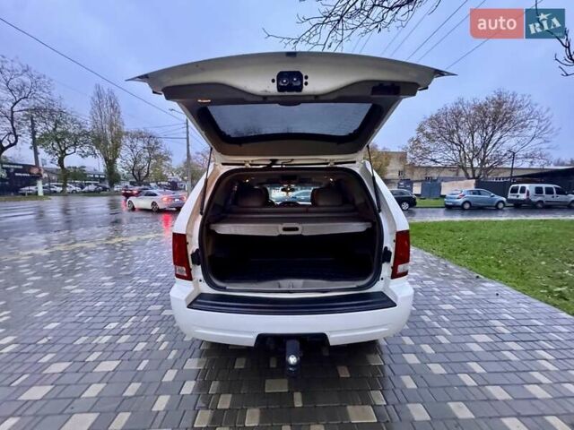 Белый Джип Гранд Чероки, объемом двигателя 4.7 л и пробегом 228 тыс. км за 7400 $, фото 79 на Automoto.ua