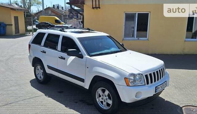 Білий Джип Grand Cherokee, об'ємом двигуна 4.7 л та пробігом 220 тис. км за 11300 $, фото 10 на Automoto.ua