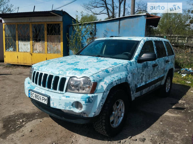 Білий Джип Grand Cherokee, об'ємом двигуна 3 л та пробігом 257 тис. км за 8000 $, фото 1 на Automoto.ua