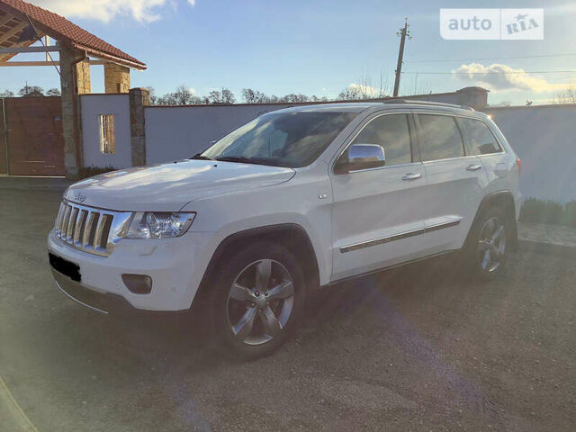 Білий Джип Grand Cherokee, об'ємом двигуна 3 л та пробігом 165 тис. км за 17500 $, фото 4 на Automoto.ua