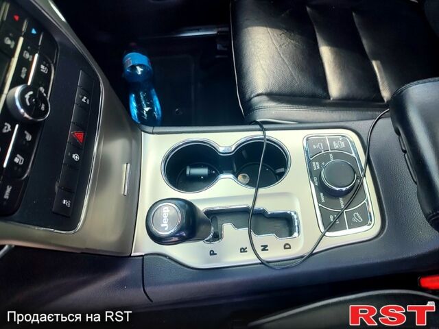 Білий Джип Grand Cherokee, об'ємом двигуна 3 л та пробігом 285 тис. км за 12800 $, фото 4 на Automoto.ua