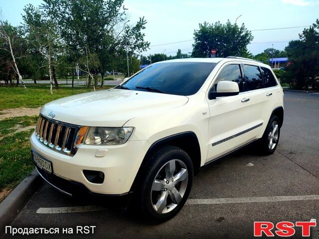 Білий Джип Grand Cherokee, об'ємом двигуна 3 л та пробігом 285 тис. км за 12800 $, фото 1 на Automoto.ua