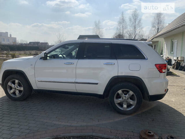 Білий Джип Grand Cherokee, об'ємом двигуна 2.99 л та пробігом 258 тис. км за 15000 $, фото 6 на Automoto.ua