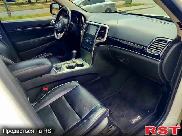 Білий Джип Grand Cherokee, об'ємом двигуна 3 л та пробігом 285 тис. км за 12800 $, фото 2 на Automoto.ua