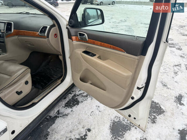 Білий Джип Grand Cherokee, об'ємом двигуна 3 л та пробігом 180 тис. км за 12800 $, фото 13 на Automoto.ua