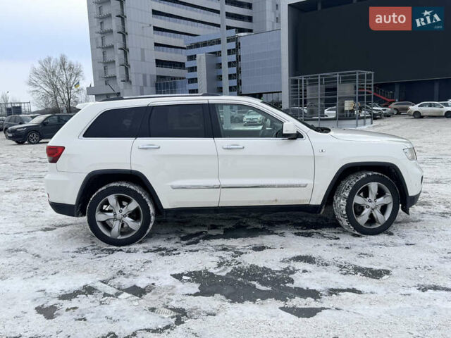 Білий Джип Grand Cherokee, об'ємом двигуна 3 л та пробігом 180 тис. км за 12800 $, фото 3 на Automoto.ua