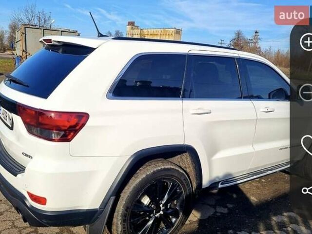 Белый Джип Гранд Чероки, объемом двигателя 3 л и пробегом 255 тыс. км за 16500 $, фото 2 на Automoto.ua