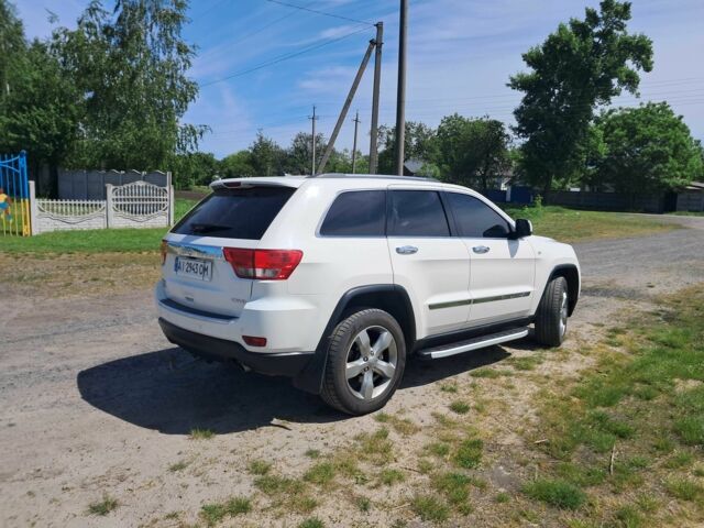 Белый Джип Гранд Чероки, объемом двигателя 3 л и пробегом 165 тыс. км за 15500 $, фото 4 на Automoto.ua