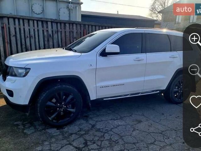 Белый Джип Гранд Чероки, объемом двигателя 3 л и пробегом 255 тыс. км за 16500 $, фото 1 на Automoto.ua