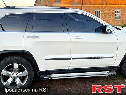 Білий Джип Grand Cherokee, об'ємом двигуна 3.6 л та пробігом 178 тис. км за 15500 $, фото 1 на Automoto.ua
