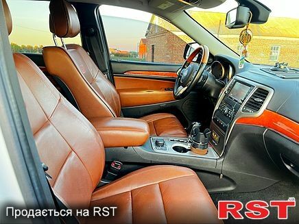 Білий Джип Grand Cherokee, об'ємом двигуна 3.6 л та пробігом 178 тис. км за 15500 $, фото 4 на Automoto.ua