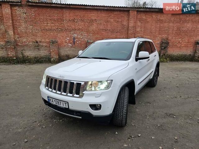 Білий Джип Grand Cherokee, об'ємом двигуна 2.99 л та пробігом 239 тис. км за 17500 $, фото 1 на Automoto.ua