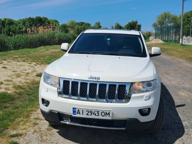 Белый Джип Гранд Чероки, объемом двигателя 3 л и пробегом 165 тыс. км за 15500 $, фото 1 на Automoto.ua