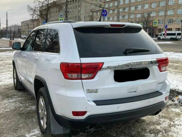 Белый Джип Гранд Чероки, объемом двигателя 3 л и пробегом 135 тыс. км за 14900 $, фото 2 на Automoto.ua