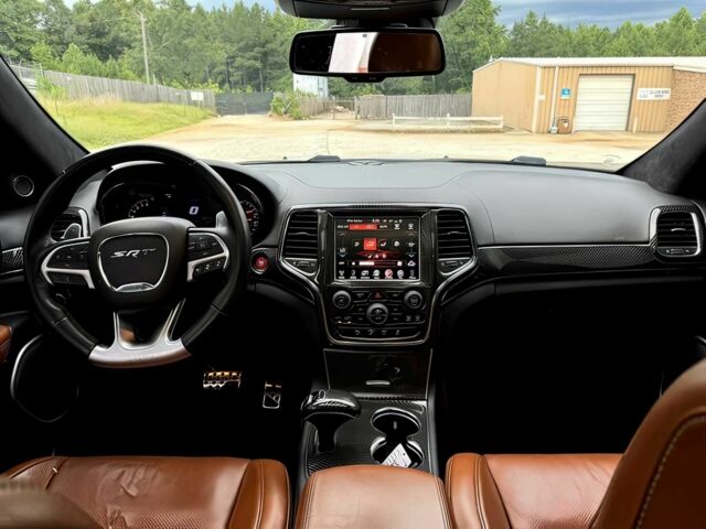 Белый Джип Гранд Чероки, объемом двигателя 6.4 л и пробегом 130 тыс. км за 12800 $, фото 9 на Automoto.ua