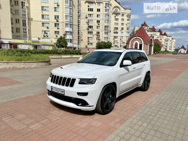 Білий Джип Grand Cherokee, об'ємом двигуна 5.7 л та пробігом 84 тис. км за 35000 $, фото 5 на Automoto.ua