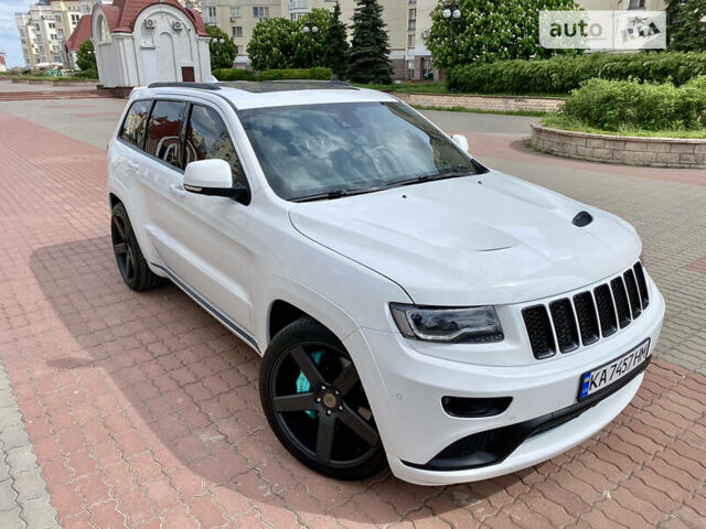 Білий Джип Grand Cherokee, об'ємом двигуна 5.7 л та пробігом 84 тис. км за 35000 $, фото 1 на Automoto.ua