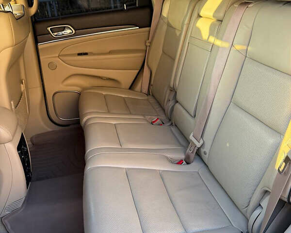 Белый Джип Гранд Чероки, объемом двигателя 5.7 л и пробегом 88 тыс. км за 36500 $, фото 19 на Automoto.ua