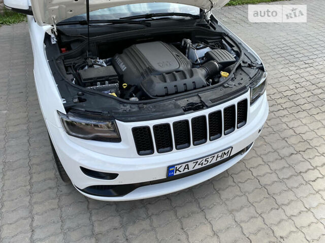 Білий Джип Grand Cherokee, об'ємом двигуна 5.7 л та пробігом 84 тис. км за 35000 $, фото 92 на Automoto.ua