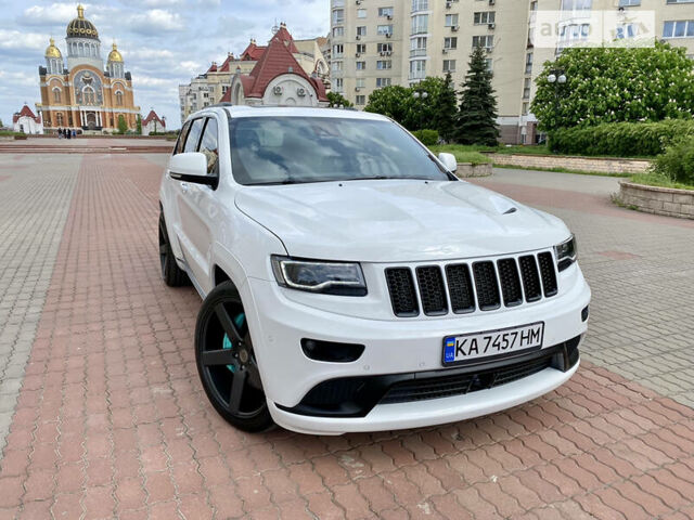 Білий Джип Grand Cherokee, об'ємом двигуна 5.7 л та пробігом 84 тис. км за 35000 $, фото 2 на Automoto.ua