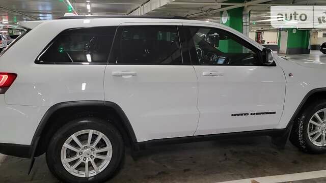 Білий Джип Grand Cherokee, об'ємом двигуна 5.7 л та пробігом 89 тис. км за 35000 $, фото 5 на Automoto.ua