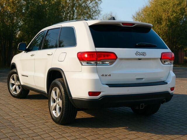 Белый Джип Гранд Чероки, объемом двигателя 3.6 л и пробегом 160 тыс. км за 18000 $, фото 2 на Automoto.ua