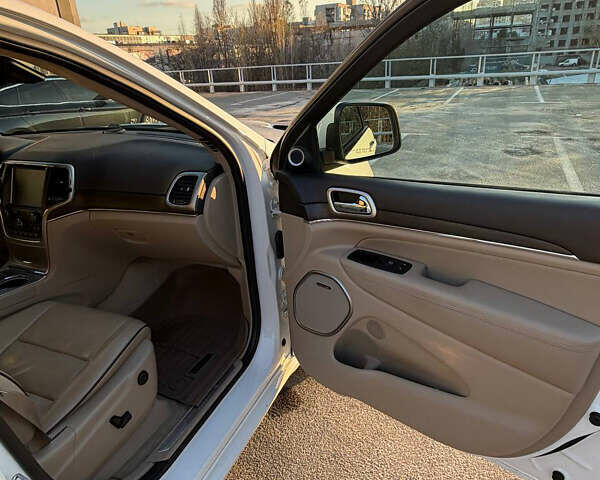 Белый Джип Гранд Чероки, объемом двигателя 5.7 л и пробегом 88 тыс. км за 38000 $, фото 14 на Automoto.ua