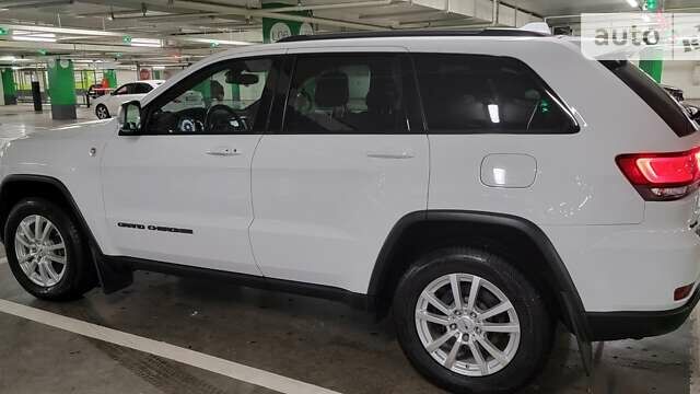 Білий Джип Grand Cherokee, об'ємом двигуна 5.7 л та пробігом 89 тис. км за 35000 $, фото 4 на Automoto.ua