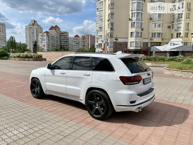 Білий Джип Grand Cherokee, об'ємом двигуна 5.7 л та пробігом 84 тис. км за 35000 $, фото 9 на Automoto.ua