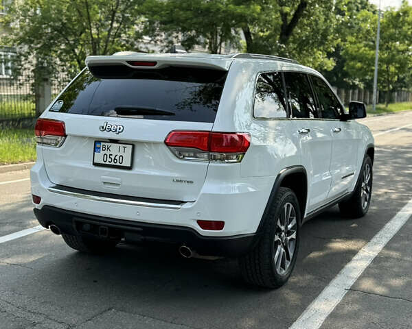 Білий Джип Grand Cherokee, об'ємом двигуна 5.65 л та пробігом 108 тис. км за 26700 $, фото 7 на Automoto.ua