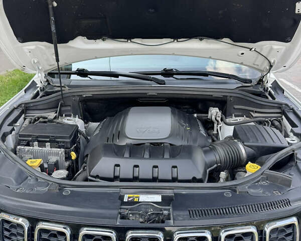 Білий Джип Grand Cherokee, об'ємом двигуна 5.65 л та пробігом 108 тис. км за 26700 $, фото 18 на Automoto.ua