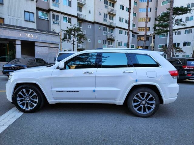 Білий Джип Grand Cherokee, об'ємом двигуна 3 л та пробігом 107 тис. км за 25100 $, фото 1 на Automoto.ua