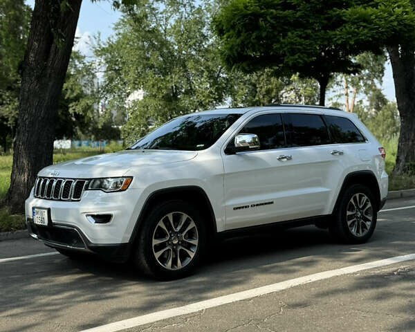 Білий Джип Grand Cherokee, об'ємом двигуна 5.65 л та пробігом 108 тис. км за 26700 $, фото 4 на Automoto.ua