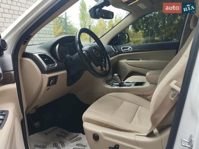 Белый Джип Гранд Чероки, объемом двигателя 3.6 л и пробегом 165 тыс. км за 22490 $, фото 13 на Automoto.ua