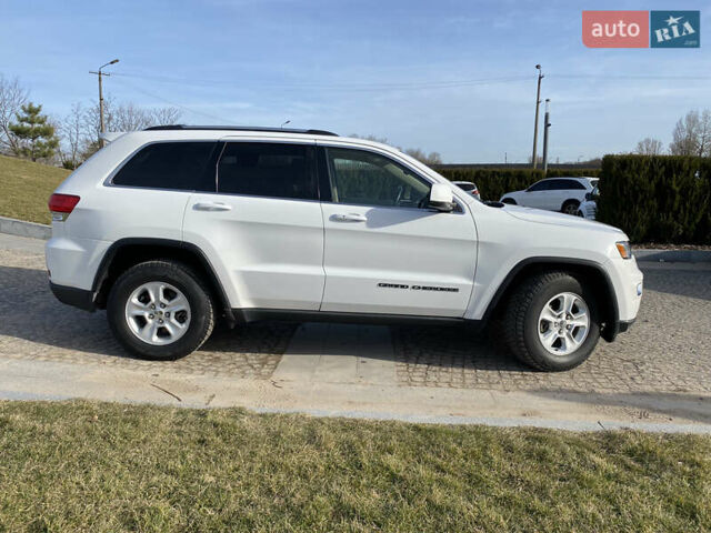 Білий Джип Grand Cherokee, об'ємом двигуна 3.6 л та пробігом 74 тис. км за 23000 $, фото 3 на Automoto.ua