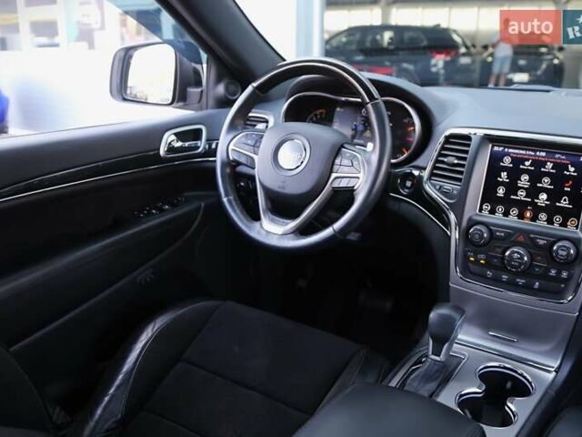 Белый Джип Гранд Чероки, объемом двигателя 5.65 л и пробегом 80 тыс. км за 35900 $, фото 12 на Automoto.ua