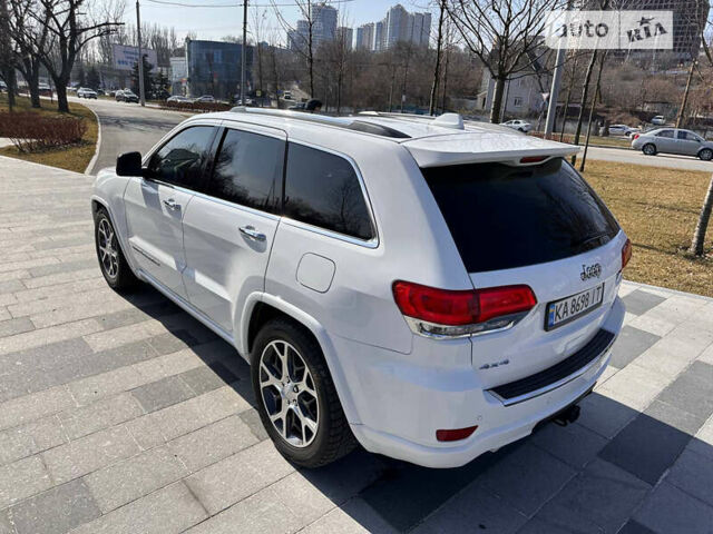 Білий Джип Grand Cherokee, об'ємом двигуна 5.7 л та пробігом 66 тис. км за 37000 $, фото 5 на Automoto.ua