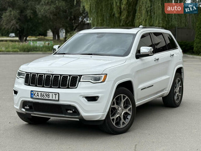 Білий Джип Grand Cherokee, об'ємом двигуна 5.7 л та пробігом 93 тис. км за 34900 $, фото 2 на Automoto.ua