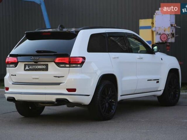 Белый Джип Гранд Чероки, объемом двигателя 5.65 л и пробегом 80 тыс. км за 35900 $, фото 6 на Automoto.ua