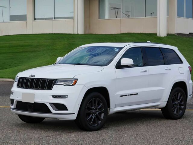 Білий Джип Grand Cherokee, об'ємом двигуна 5.7 л та пробігом 65 тис. км за 6000 $, фото 2 на Automoto.ua