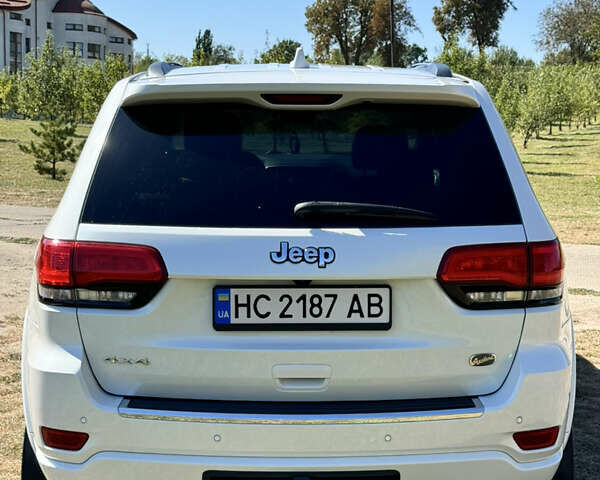 Белый Джип Гранд Чероки, объемом двигателя 3.6 л и пробегом 102 тыс. км за 28000 $, фото 2 на Automoto.ua