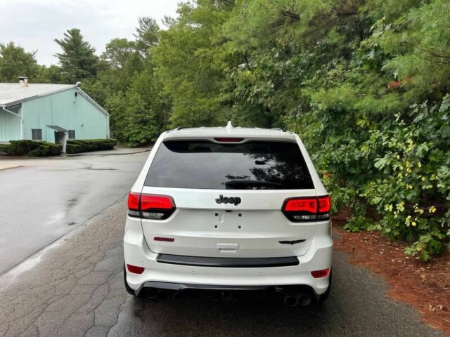 Белый Джип Гранд Чероки, объемом двигателя 6.2 л и пробегом 31 тыс. км за 13200 $, фото 5 на Automoto.ua