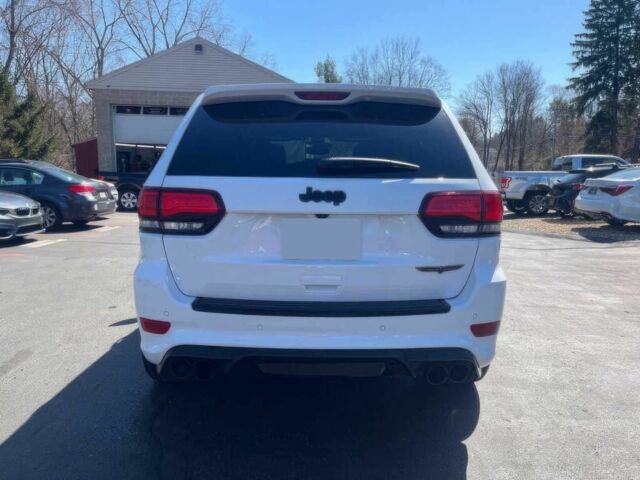 Белый Джип Гранд Чероки, объемом двигателя 6.2 л и пробегом 39 тыс. км за 12400 $, фото 6 на Automoto.ua