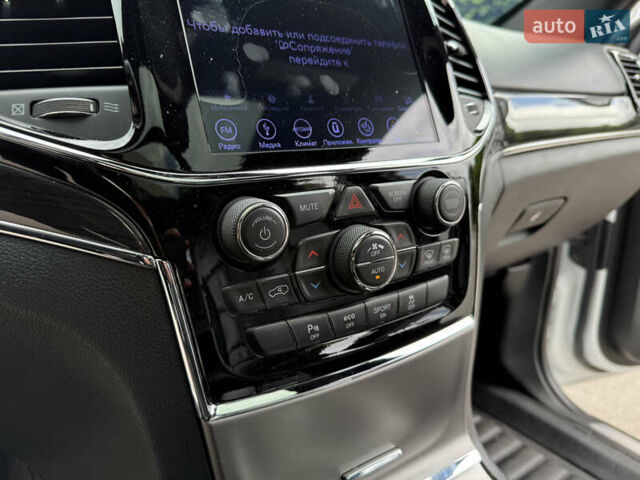 Білий Джип Grand Cherokee, об'ємом двигуна 5.7 л та пробігом 93 тис. км за 34900 $, фото 26 на Automoto.ua