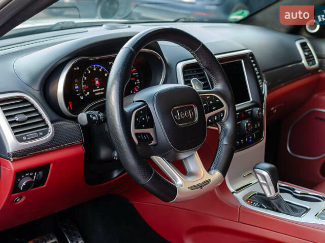 Білий Джип Grand Cherokee, об'ємом двигуна 6.2 л та пробігом 148 тис. км за 57700 $, фото 19 на Automoto.ua
