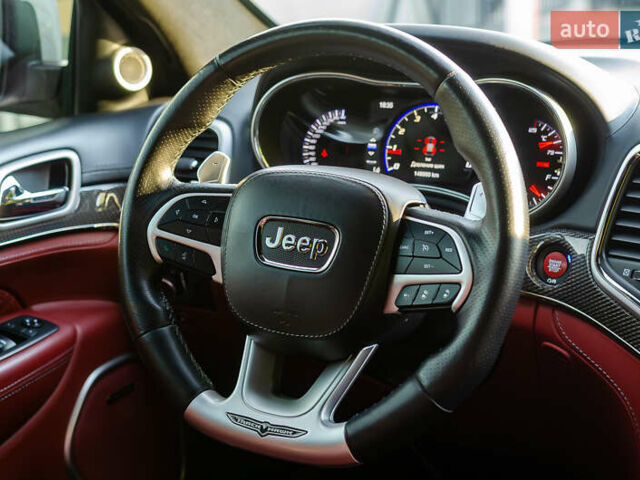 Білий Джип Grand Cherokee, об'ємом двигуна 6.2 л та пробігом 148 тис. км за 57700 $, фото 20 на Automoto.ua