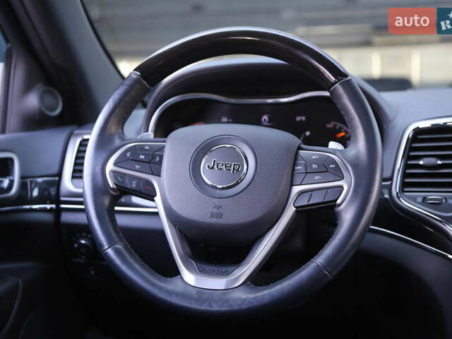 Белый Джип Гранд Чероки, объемом двигателя 5.65 л и пробегом 80 тыс. км за 35900 $, фото 15 на Automoto.ua